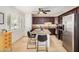 Modern kitchen featuring a center island with seating, stainless steel appliances and plenty of storage at 1815 N 74Th St, Scottsdale, AZ 85257