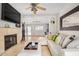 Cozy living room featuring a fireplace, plush seating, and a serene ambiance at 1815 N 74Th St, Scottsdale, AZ 85257
