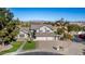 Two-story house with three car garage and landscaped yard at 1848 E Mallory St, Mesa, AZ 85203