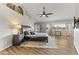 Spacious primary bedroom with large windows and wood floors at 1848 E Mallory St, Mesa, AZ 85203