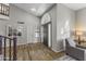 Bright and spacious entryway with wood floors and a staircase at 1848 E Mallory St, Mesa, AZ 85203