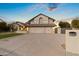 Two-story house with a double garage and manicured lawn at 1848 E Mallory St, Mesa, AZ 85203