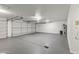 Bright and clean garage with epoxy flooring at 1848 E Mallory St, Mesa, AZ 85203