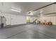 Large garage with ample storage space and epoxy flooring at 1848 E Mallory St, Mesa, AZ 85203