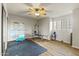 Home gym with various equipment and flooring at 1848 E Mallory St, Mesa, AZ 85203