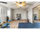 Home gym with mirrored walls and various equipment at 1848 E Mallory St, Mesa, AZ 85203