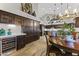 Spacious kitchen with dark wood cabinets, marble countertops, and stainless steel appliances at 1848 E Mallory St, Mesa, AZ 85203