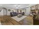 Living room with hardwood floors and a view to the kitchen at 1848 E Mallory St, Mesa, AZ 85203
