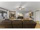 Spacious living room with a cozy fireplace and hardwood floors at 1848 E Mallory St, Mesa, AZ 85203