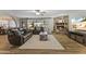 Open living room with hardwood floors and a view to dining area at 1848 E Mallory St, Mesa, AZ 85203