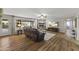 Bright living room featuring hardwood floors and a stone fireplace at 1848 E Mallory St, Mesa, AZ 85203