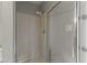 Clean shower with glass enclosure and built-in shelving at 1848 E Mallory St, Mesa, AZ 85203