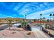 Single story home with desert landscaping and a two-car garage at 18843 N 15Th Pl, Phoenix, AZ 85024