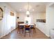 Modern dining room with a round table and four chairs, an open concept to the kitchen at 2329 N Evergreen St, Phoenix, AZ 85006