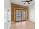 Bedroom with French doors opening to backyard patio at 2501 N Edgemere St, Phoenix, AZ 85006