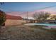 Relaxing pool area with brick shed in the backyard at 2501 N Edgemere St, Phoenix, AZ 85006