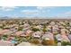 Aerial view of neighborhood with houses, pools, and distant mountains at 26645 N 42Nd St, Cave Creek, AZ 85331