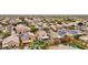 Aerial view of houses with solar panels, pools, and a playground at 26645 N 42Nd St, Cave Creek, AZ 85331