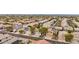 Aerial view of houses with solar panels and pools in a residential neighborhood at 26645 N 42Nd St, Cave Creek, AZ 85331