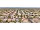 Aerial view of community featuring numerous houses, pools, and solar panels at 26645 N 42Nd St, Cave Creek, AZ 85331