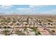 Aerial view of neighborhood with houses, pools, and distant mountains at 26645 N 42Nd St, Cave Creek, AZ 85331