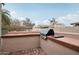 Outdoor kitchen with built-in grill and ample counter space at 26645 N 42Nd St, Cave Creek, AZ 85331
