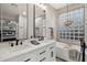 Modern bathroom with double vanity, free standing tub and walk in shower at 26645 N 42Nd St, Cave Creek, AZ 85331