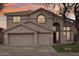 Two-story house with a three-car garage and neutral color scheme at 26645 N 42Nd St, Cave Creek, AZ 85331