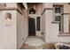 The home has a decorative front door and neutral colored exterior at 26645 N 42Nd St, Cave Creek, AZ 85331