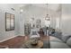 Open concept living room, dining area, and kitchen with hardwood floors at 26645 N 42Nd St, Cave Creek, AZ 85331