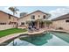 Home features a refreshing pool and relaxing patio area, perfect for outdoor entertainment at 26645 N 42Nd St, Cave Creek, AZ 85331