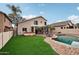 Home features a refreshing pool and relaxing patio area, perfect for outdoor entertainment at 26645 N 42Nd St, Cave Creek, AZ 85331