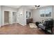 Cozy sitting area with comfortable arm chair and neutral color scheme at 26645 N 42Nd St, Cave Creek, AZ 85331