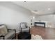 Bright sitting area with two armchairs and a wooden console table at 26645 N 42Nd St, Cave Creek, AZ 85331