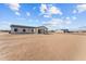View of backyard and new construction home at 28813 N 201St Ave, Wittmann, AZ 85361
