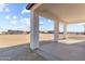 Covered patio with view of expansive backyard at 28813 N 201St Ave, Wittmann, AZ 85361