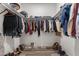 Large walk-in closet with ample shelving and hanging space at 28813 N 201St Ave, Wittmann, AZ 85361