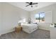 Bright bedroom with queen bed, window seating, and large window at 2911 W Latona Rd # 1, Laveen, AZ 85339