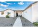 Clean lines and a stylish walkway highlight this home's exterior at 2911 W Latona Rd # 1, Laveen, AZ 85339
