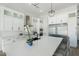 Modern kitchen with white cabinets, quartz countertops, and stainless steel appliances at 2911 W Latona Rd # 1, Laveen, AZ 85339