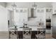 Gourmet kitchen boasting white cabinets, stainless steel appliances, and a large island at 2911 W Latona Rd # 1, Laveen, AZ 85339