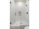 Spacious shower with glass enclosure and built-in seat at 2911 W Latona Rd # 1, Laveen, AZ 85339