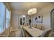 Light and airy dining room featuring a wood table at 3941 E Iris Dr, Chandler, AZ 85286