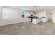Modern kitchen with island, stainless steel appliances, and granite countertops at 40055 W Venture Rd, Maricopa, AZ 85138
