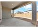 Covered patio providing backyard access at 40055 W Venture Rd, Maricopa, AZ 85138