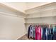Spacious closet with hanging rods and shelving at 42493 W Candyland Pl, Maricopa, AZ 85138