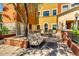Relaxing community patio with seating and landscaping at 42493 W Candyland Pl, Maricopa, AZ 85138