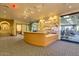 Fitness center with reception desk and glimpse of gym equipment at 42493 W Candyland Pl, Maricopa, AZ 85138