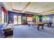 Game room featuring two billiard tables and air hockey at 42493 W Candyland Pl, Maricopa, AZ 85138