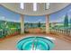 Circular hot tub with scenic mural at 42493 W Candyland Pl, Maricopa, AZ 85138